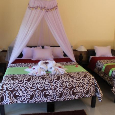 Mans Cottages & Spa Pemuteran  Ruang foto