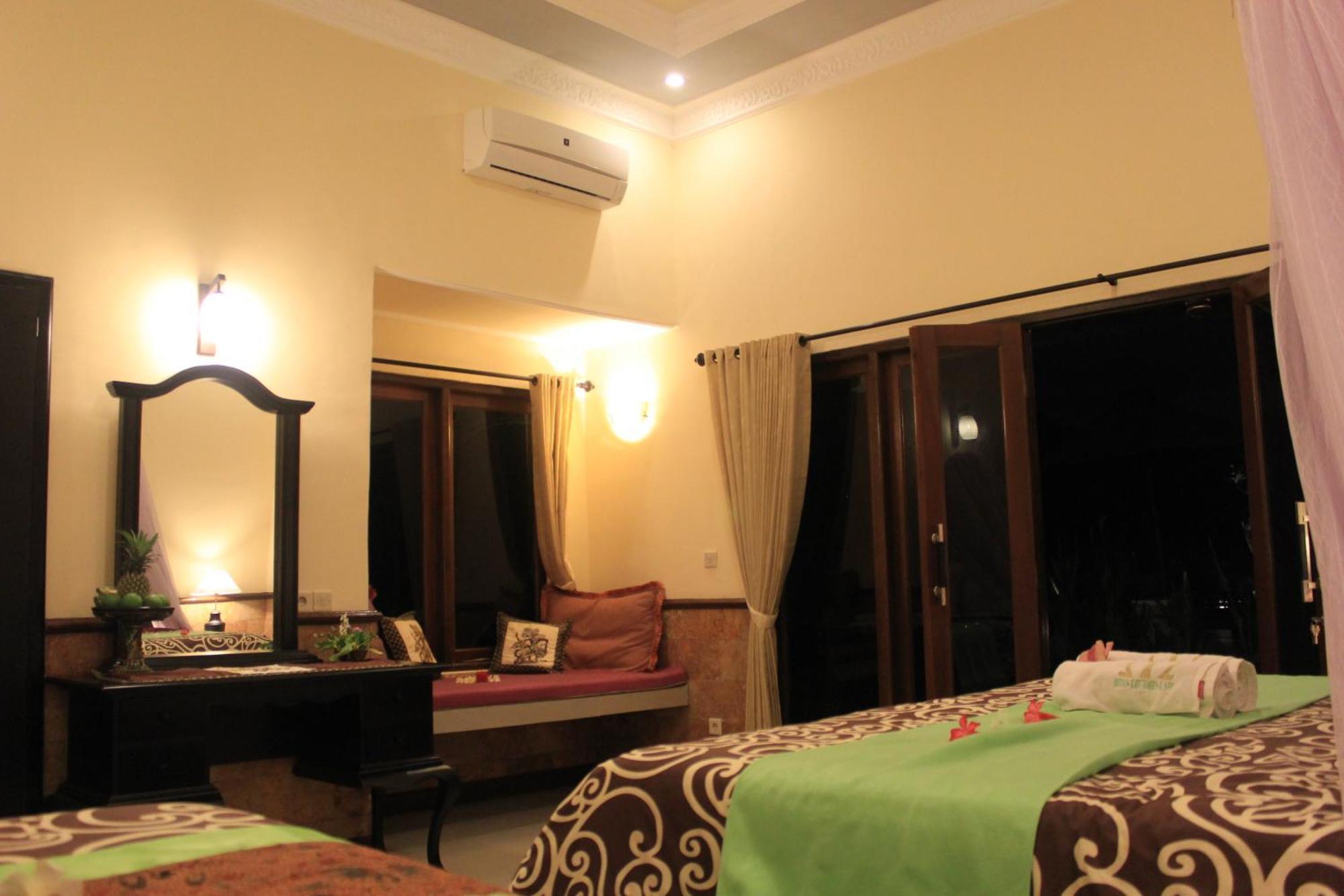 Mans Cottages & Spa Pemuteran  Ruang foto