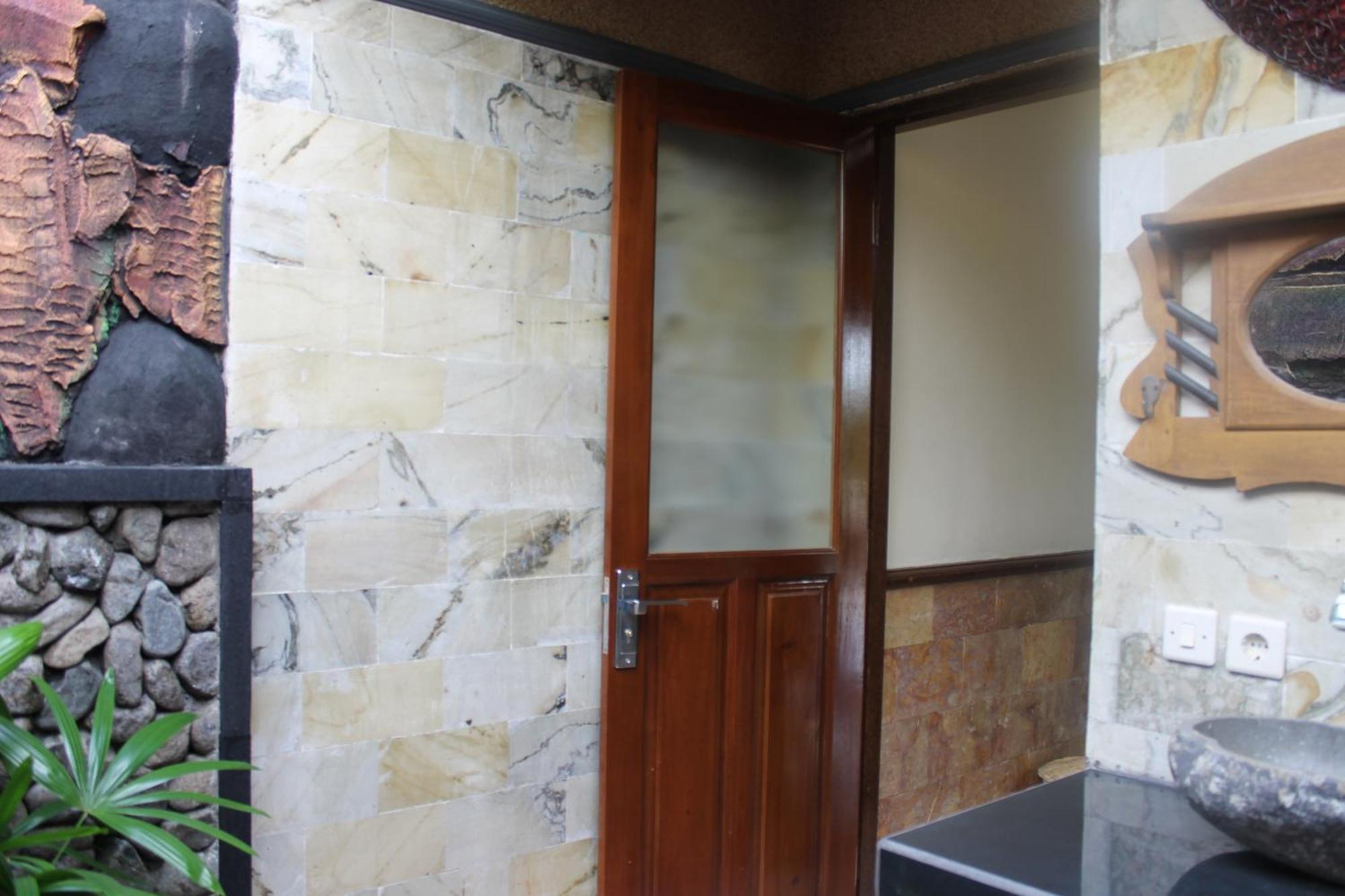 Mans Cottages & Spa Pemuteran  Ruang foto